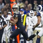 New Orleans Saints wide receiver Michael Thomas 13 looks over his shoulder at Los Angeles Rams cor