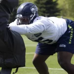 L.J. Collier Seattle Seahawks defensive end L J Collier 91 performing drills during the S