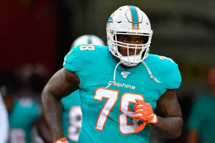 TAMPA FL AUGUST 16 Miami Dolphins offensive tackle Laremy Tunsil 78 enters the field prior to