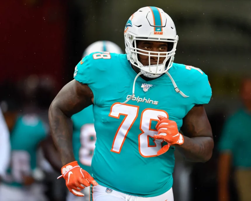 TAMPA FL AUGUST 16 Miami Dolphins offensive tackle Laremy Tunsil 78 enters the field prior to