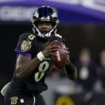 Baltimore Ravens quarterback Lamar Jackson (8) runs the ball in the 3rd quarter against New York Jets at M&T Bank Stadiu