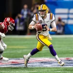 LSU s Joe Burrow 9 scrambles during the Chick-Fil-A Peach Bowl - a College Football Playoff Nationall Semifinal - featuring the Oklahoma Sooners and the LSU Tigers, played at Mercedes Benz Stadium in Atlanta, Georgia. /CSM NCAA, College League, USA Football 2019