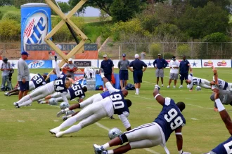 The Dallas Cowboys at their 2008 summer training camp in Oxnard, CA during a training session working out.