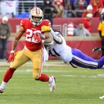 SANTA CLARA, CA - JANUARY 11: San Francisco 49ers Running Back Matt Breida 22 runs as Minnesota Vikings Safety Anthony Harris 41 tries to tackle him during the NFC Divisional Playoff game between the Minnesota Vikings and the San Francisco 49ers on January 11, 2020, at Levi s Stadium in Santa Clara, CA. Photo by Brian Rothmuller/Icon Sportswire NFL, American Football Herren, USA JAN 11 NFC Divisional Playoff - Vikings at 49ers Icon200111027