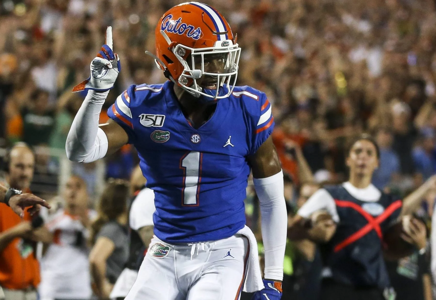August 24, 2019, Orlando, Florida, USA: Florida Gators defensive back CJ Henderson (1) wags his finger after breaking u