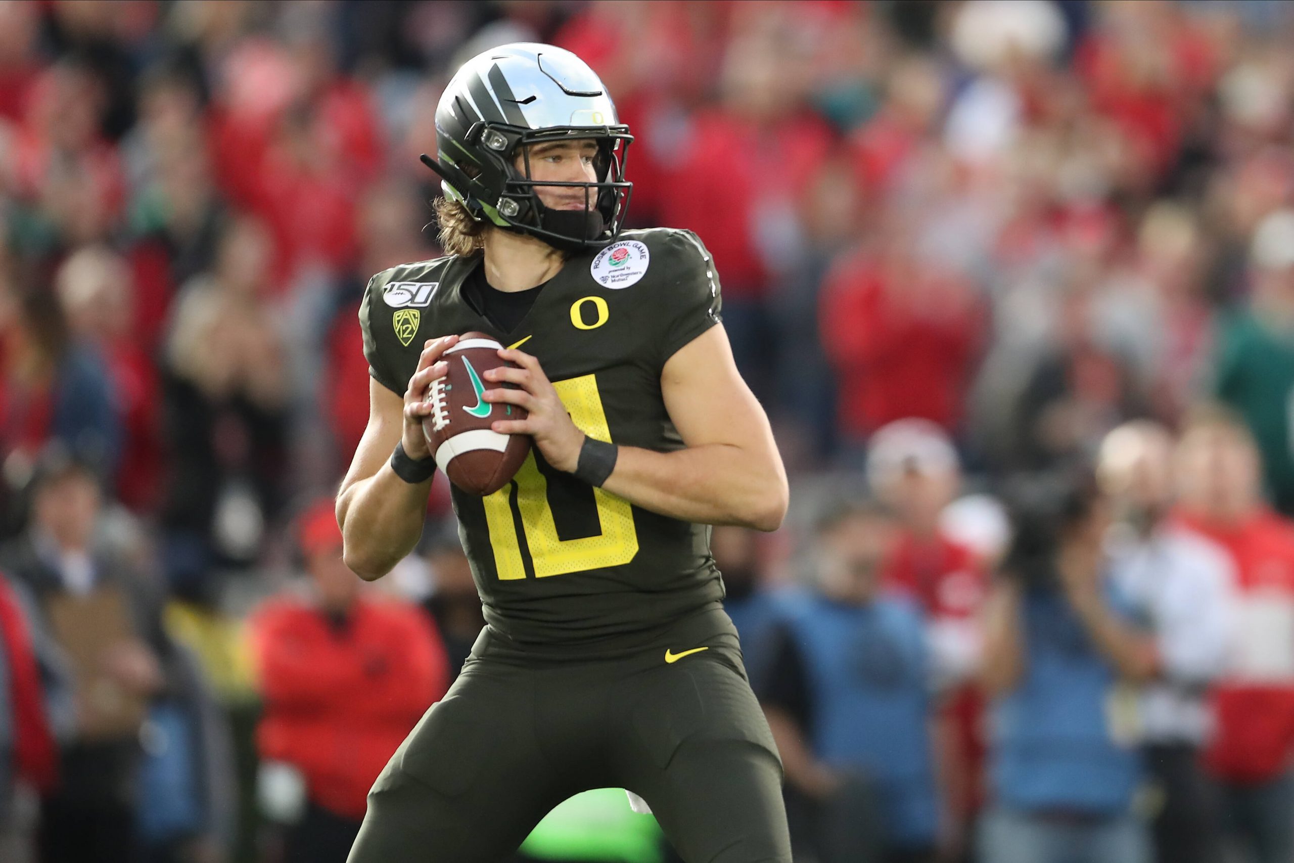 January 1, 2020: Oregon Ducks quarterback Justin Herbert (10) looks downfield for an open receiver during the game betwe