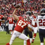 January 12, 2020, Kansas City, MO, USA: Kansas City Chiefs tight end Travis Kelce spikes the ball after scoring his firs