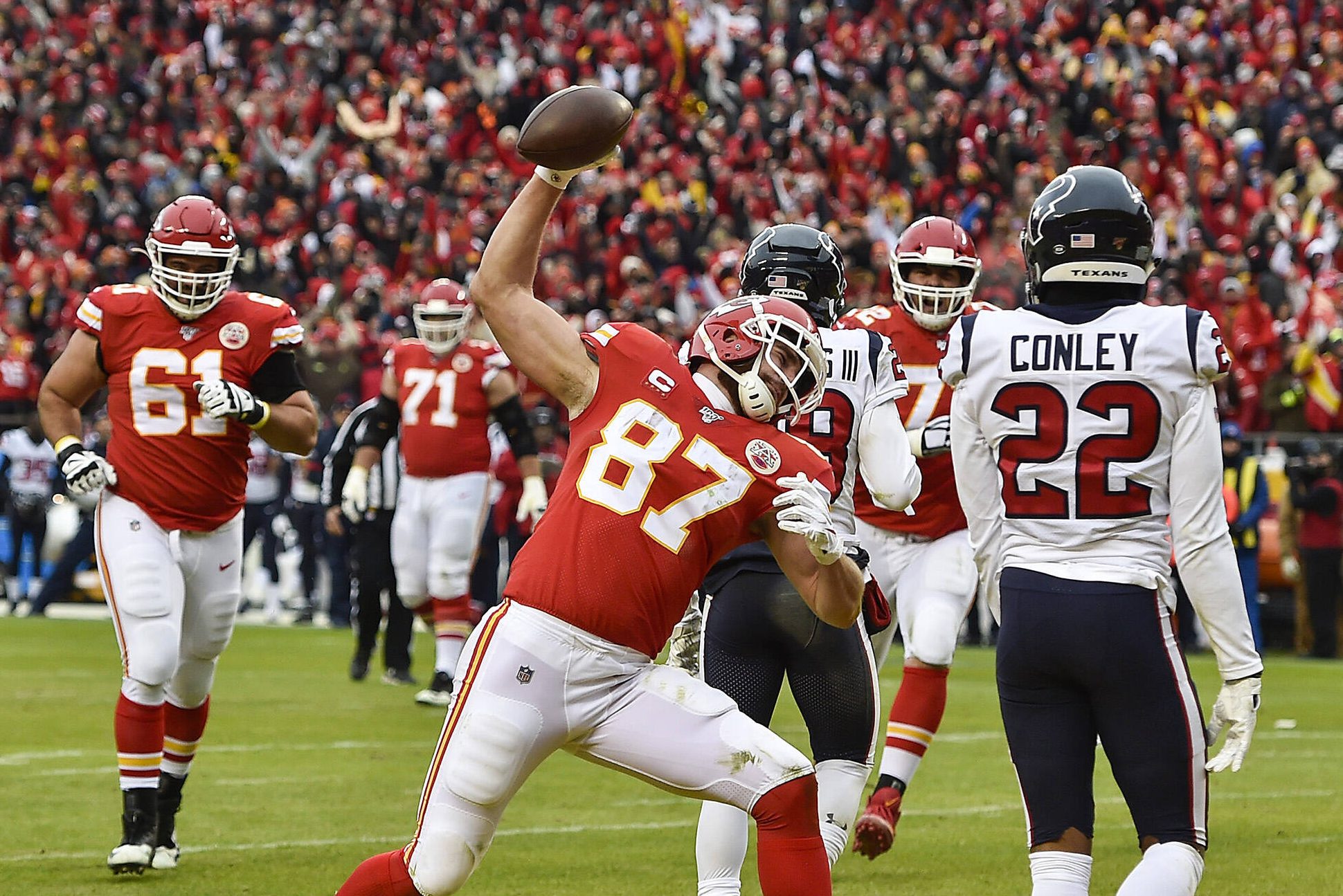 January 12, 2020, Kansas City, MO, USA: Kansas City Chiefs tight end Travis Kelce spikes the ball after scoring his firs