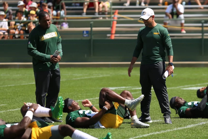 ASHWAUBENON WI AUGUST 19 Green Bay Packers head coach Matt LaFleur talks with Green Bay Packers