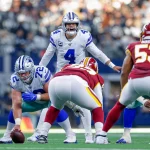 ARLINGTON, TX - DECEMBER 29: Dallas Cowboys Quarterback Dak Prescott (4) yells out the presnap signals during the NFC Ea