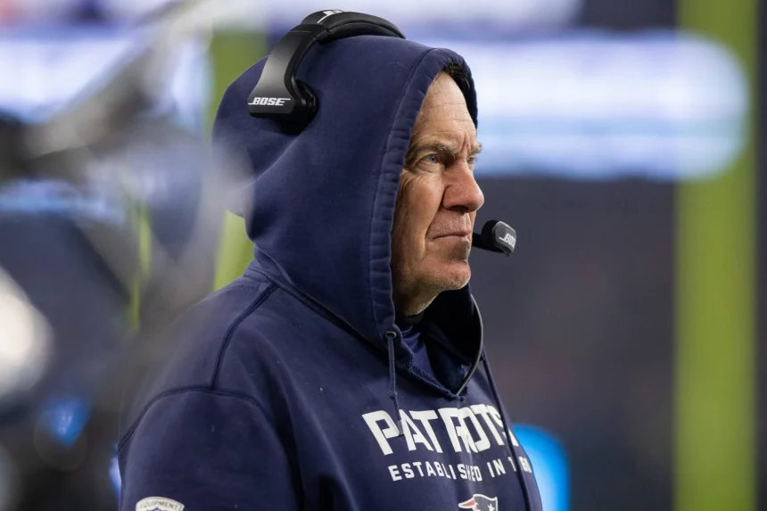 New England Patriots head coach Bill Belichick walks on the sideline in the third quarter of the NFL, American Football