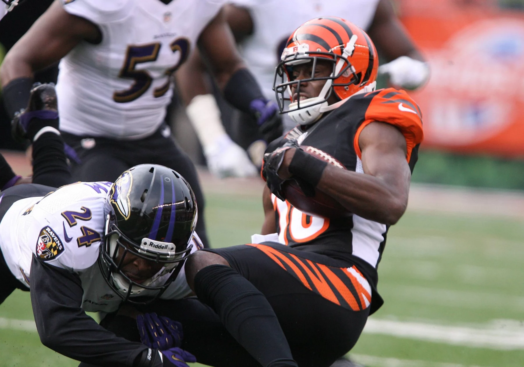 December 29 2013 wide receiver A J Green of the Cincinnati Bengals is tackled by cornerback Corey