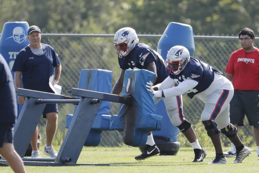 FOXBOROUGH MA JULY 28 New England Patriots head coach Bill Belichick watches New England Patriot