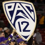 December 2 2016 Members of the Washington Huskies marching band hold up a Pac 12 logo sign during