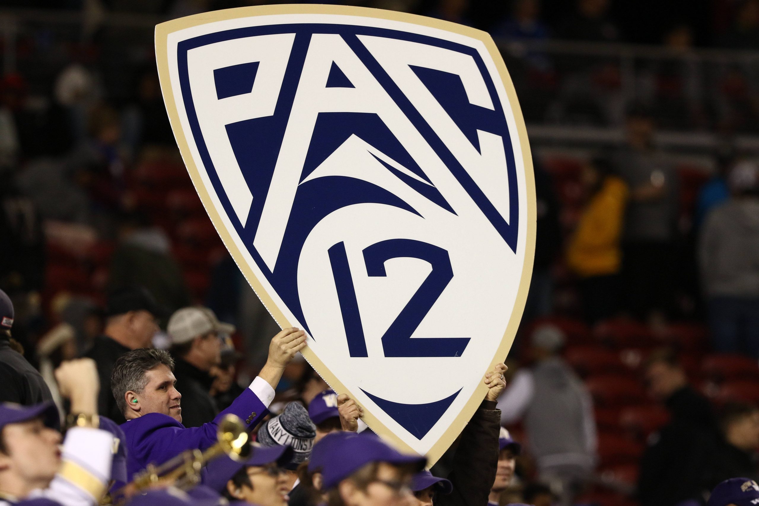 December 2 2016 Members of the Washington Huskies marching band hold up a Pac 12 logo sign during