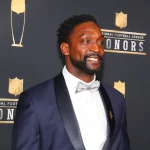 MINNEAPOLIS MN FEBRUARY 03 Charles Tillman poses for Photographs on the Red Carpet at NFL Americ