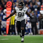 INDIANAPOLIS, IN - NOVEMBER 17: Jacksonville Jaguars defensive end Yannick Ngakoue (91) runs off the field after a fumb