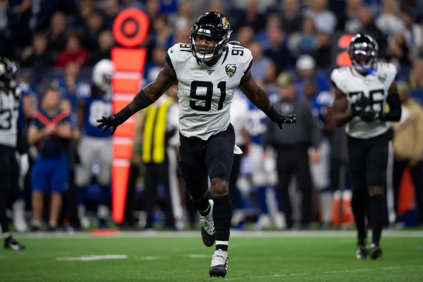 INDIANAPOLIS, IN - NOVEMBER 17: Jacksonville Jaguars defensive end Yannick Ngakoue (91) runs off the field after a fumb