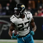 ATLANTA, GA - DECEMBER 22: Jacksonville Jaguars Running Back Leonard Fournette (27) rushes the ball during the NFL, Amer