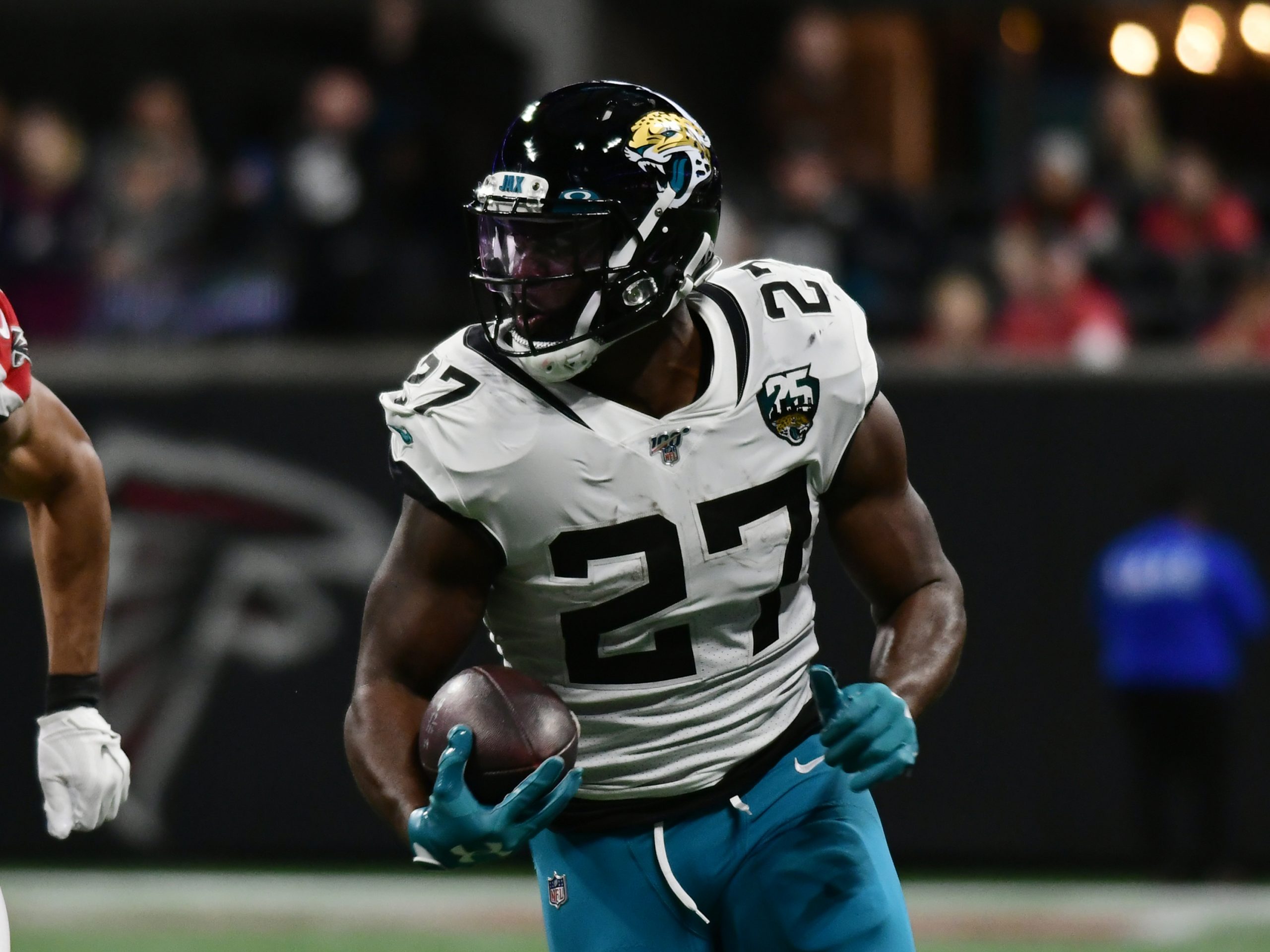 ATLANTA, GA - DECEMBER 22: Jacksonville Jaguars Running Back Leonard Fournette (27) rushes the ball during the NFL, Amer