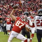 January 12, 2020, Kansas City, MO, USA: Kansas City Chiefs tight end Travis Kelce spikes the ball after scoring his firs