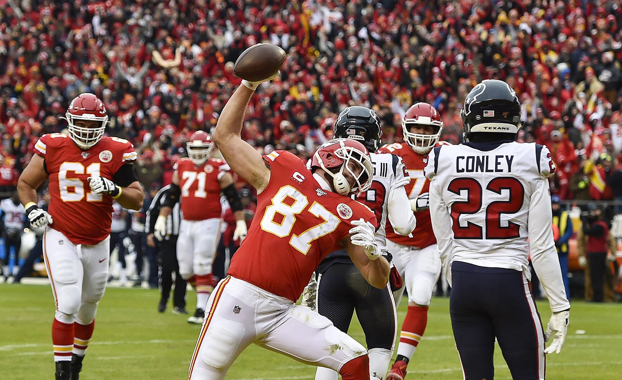 January 12, 2020, Kansas City, MO, USA: Kansas City Chiefs tight end Travis Kelce spikes the ball after scoring his firs