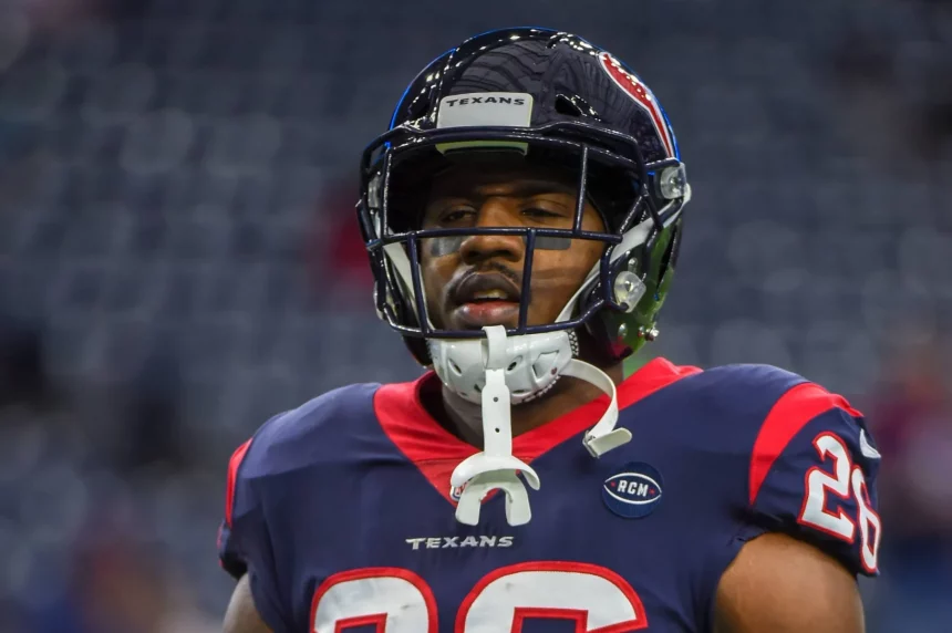 HOUSTON TX DECEMBER 30 Houston Texans Running Back Lamar Miller 26 warms up before the footbal