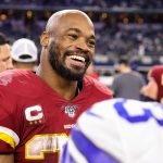 ARLINGTON, TX - DECEMBER 29: Washington Redskins Running Back Adrian Peterson (26) talks with players after the NFC East