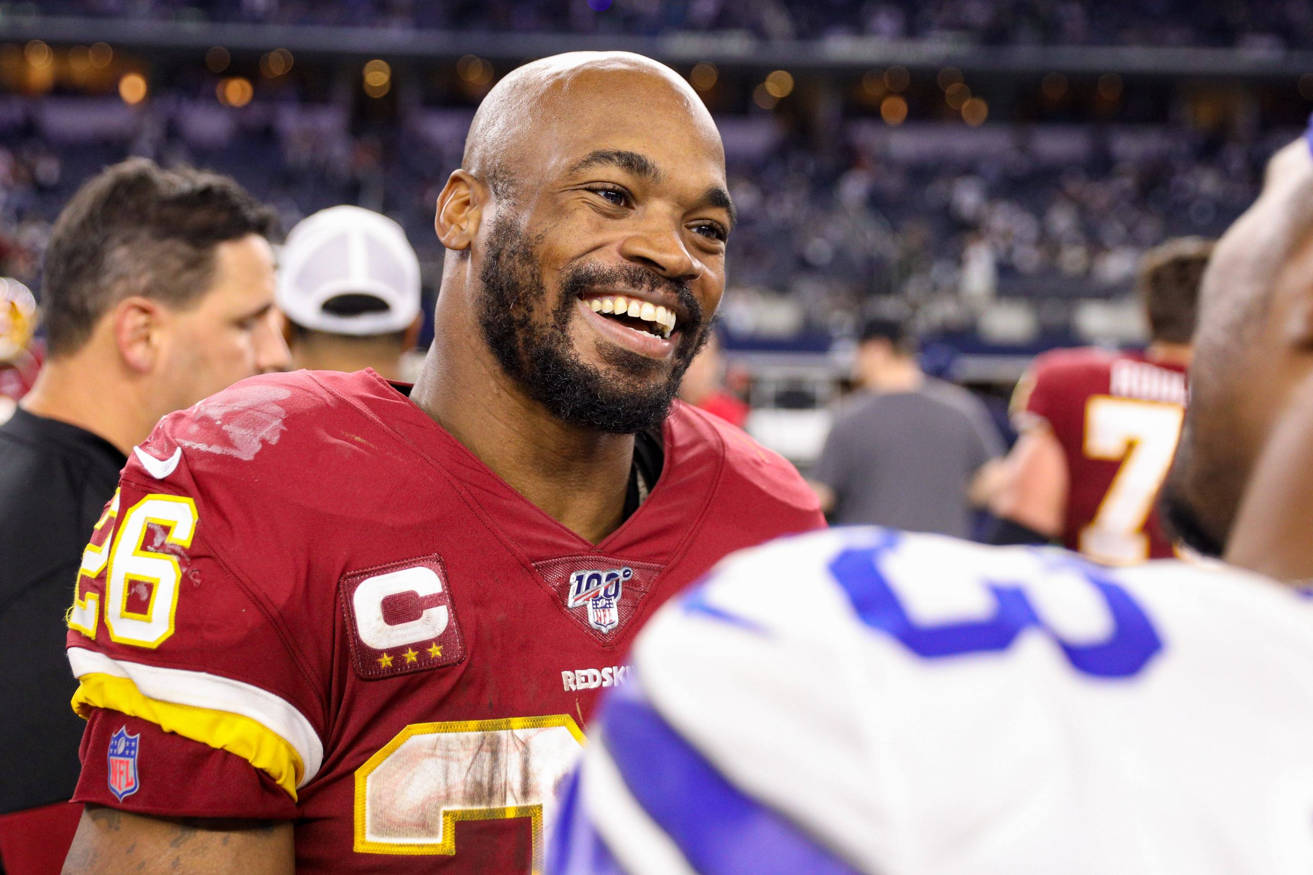 ARLINGTON, TX - DECEMBER 29: Washington Redskins Running Back Adrian Peterson (26) talks with players after the NFC East