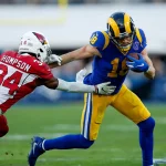 LOS ANGELES, CA - DECEMBER 29: Los Angeles Rams wide receiver Cooper Kupp (18) catches a pass and gets tackled by Arizon