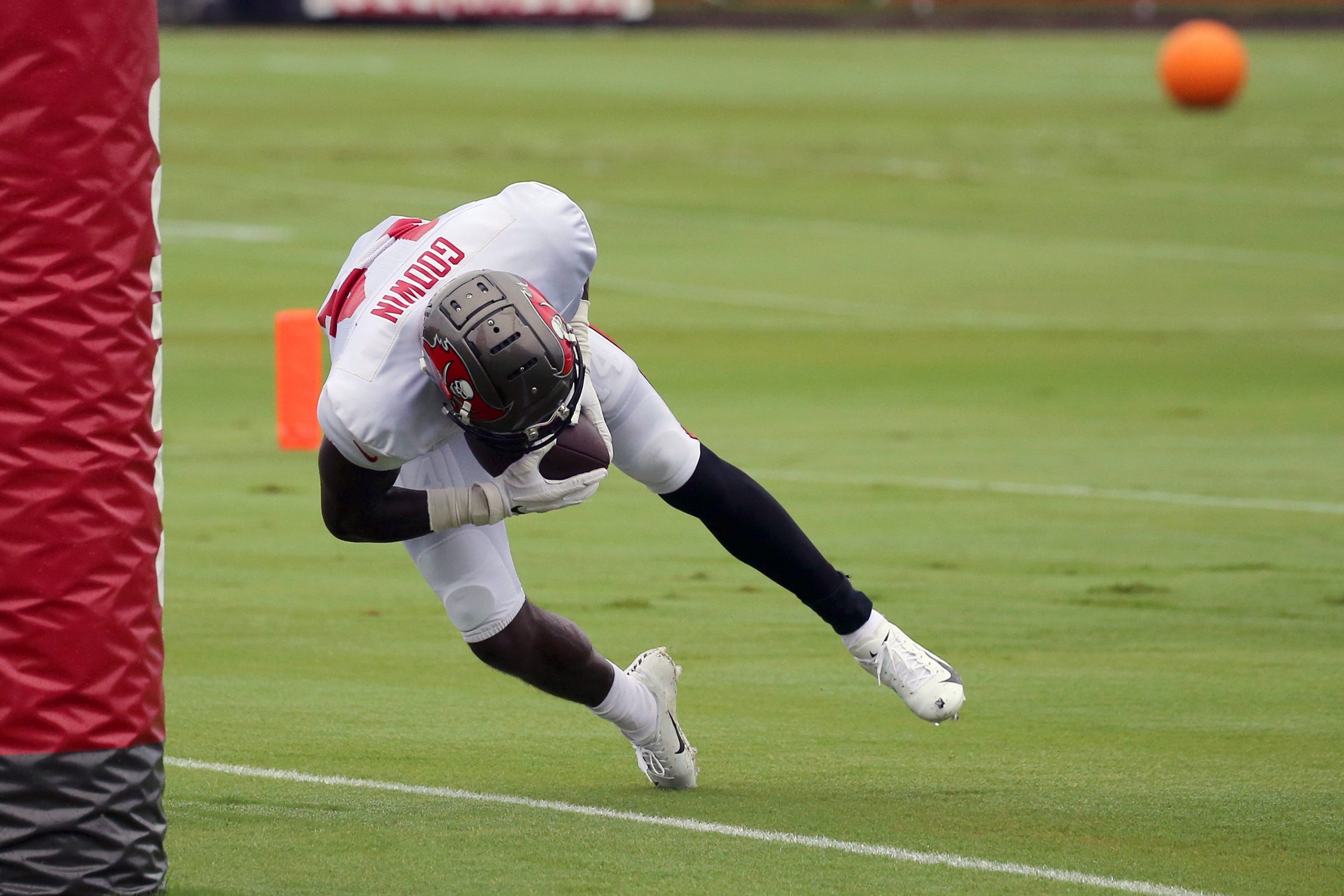 TAMPA, FL - AUG 30: The Buccaneers Chris Godwin (14) makes an outstanding catch in the back of the end zone and then get