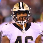 EAST RUTHERFORD NJ AUGUST 24 New Orleans Saints running back Michael Burton 46 on the sideline