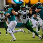 October 27, 2019, Jacksonville, Florida, USA: Jacksonville Jaguars quarterback GARDNER MINSHEW (15) escapes the reach of