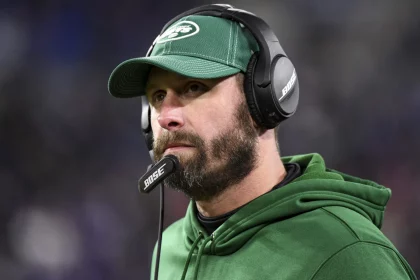 BALTIMORE, MD - DECEMBER 12: New York Jets head coach Adam Gase stands on the sidelines during the game against the Balt