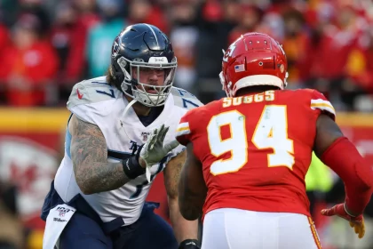 KANSAS CITY, MO - JANUARY 19: Tennessee Titans offensive tackle Taylor Lewan (77) blocks Kansas City Chiefs outside line