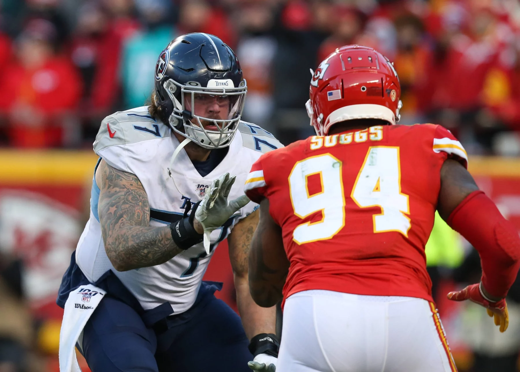 KANSAS CITY, MO - JANUARY 19: Tennessee Titans offensive tackle Taylor Lewan (77) blocks Kansas City Chiefs outside line