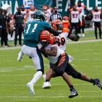 PHILADELPHIA, PA - SEPTEMBER 27: Philadelphia Eagles quarterback Carson Wentz (11) takes a shot from Cincinnati Bengals
