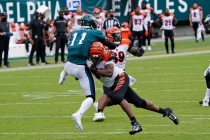 PHILADELPHIA, PA - SEPTEMBER 27: Philadelphia Eagles quarterback Carson Wentz (11) takes a shot from Cincinnati Bengals