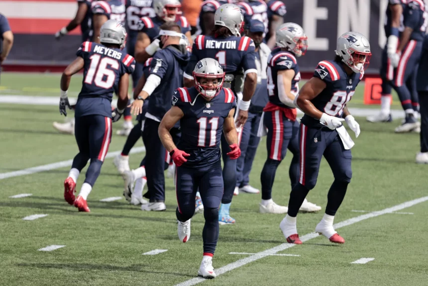 FOXBOROUGH, MA - SEPTEMBER 27: New England Patriots wide receiver Julian Edelman (11) breaks from the huddle before a ga