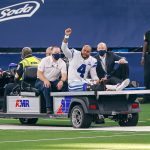 ARLINGTON, TX - OCTOBER 11: Dallas Cowboys Quarterback Dak Prescott (4) is carted off the field after suffering a leg i