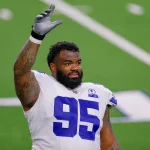 ARLINGTON, TX - OCTOBER 11: Dallas Cowboys Defensive Tackle Dontari Poe (95) waves to fans following the NFL, American F