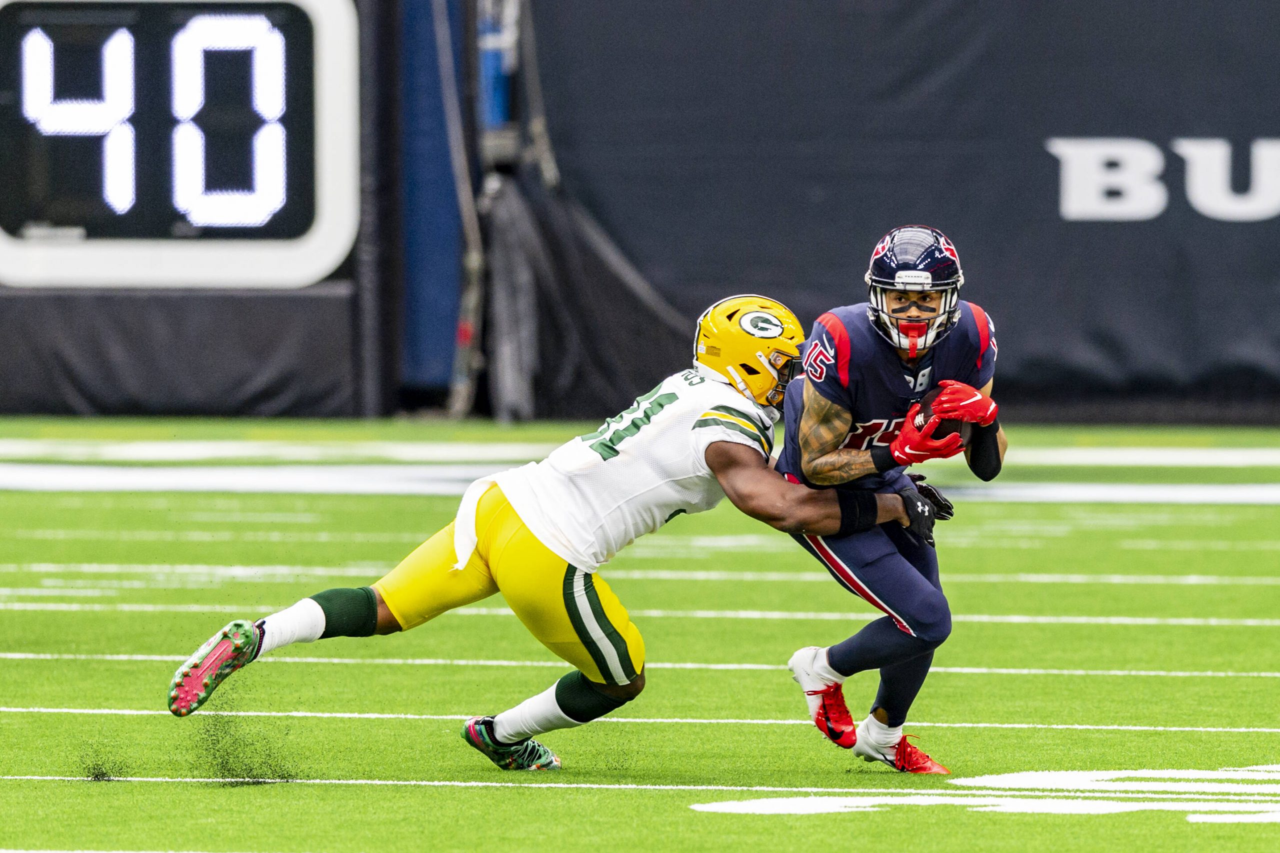 October 25, 2020 : Green Bay Packers strong safety Adrian Amos (31) tackles Houston Texans wide receiver will fuller
