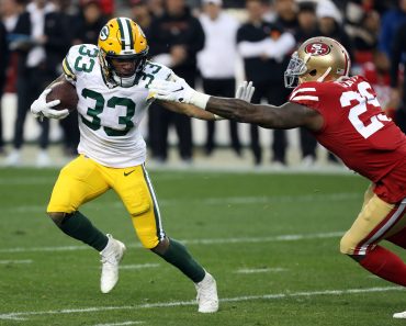 SANTA CLARA, CA - JANUARY 19: Green Bay Packers Running Back Aaron Jones rushes with the ball during an NFC Conference C