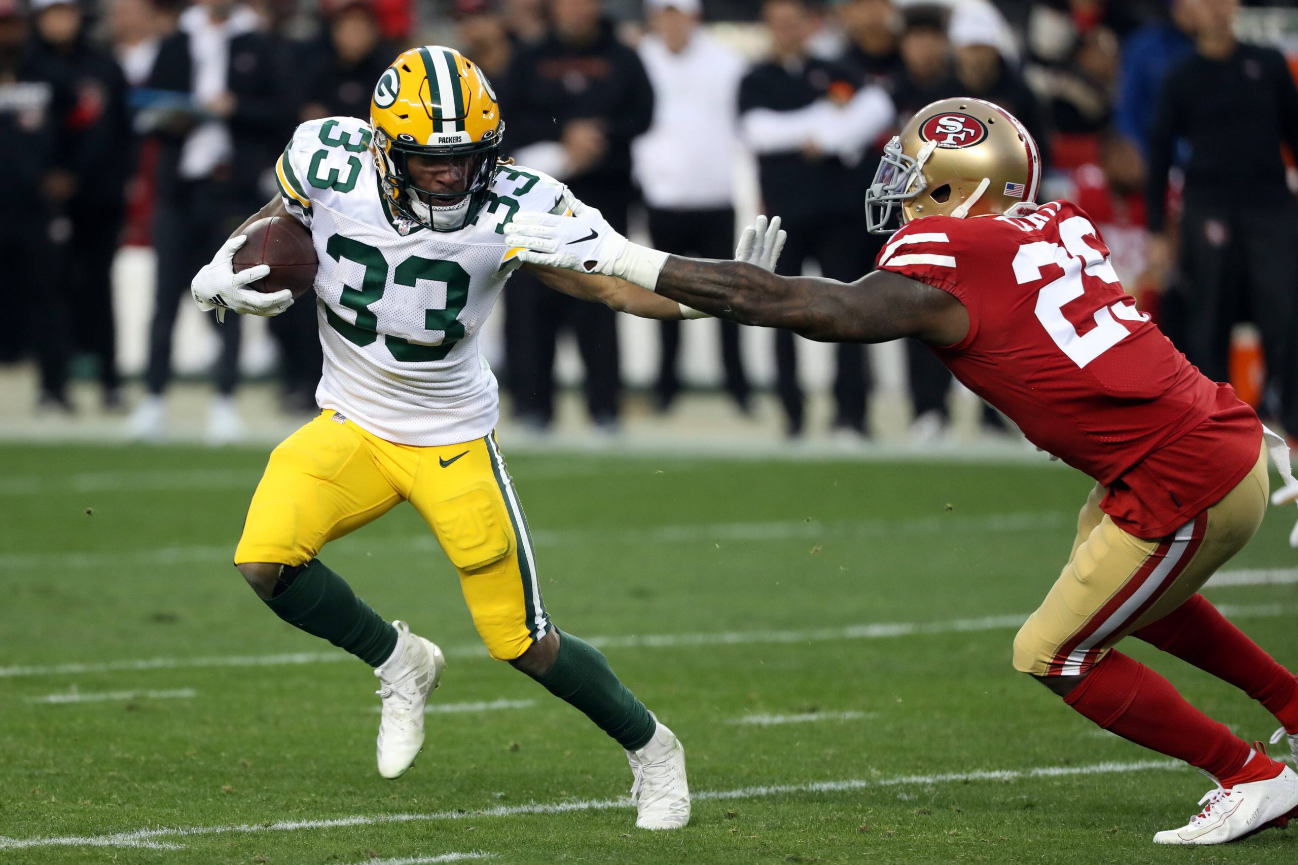 SANTA CLARA, CA - JANUARY 19: Green Bay Packers Running Back Aaron Jones rushes with the ball during an NFC Conference C