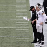 FOXBOROUGH, MA - SEPTEMBER 27: Las Vegas Raiders head coach Jon Gruden and Las Vegas Raiders quarterback Derek Carr (4)