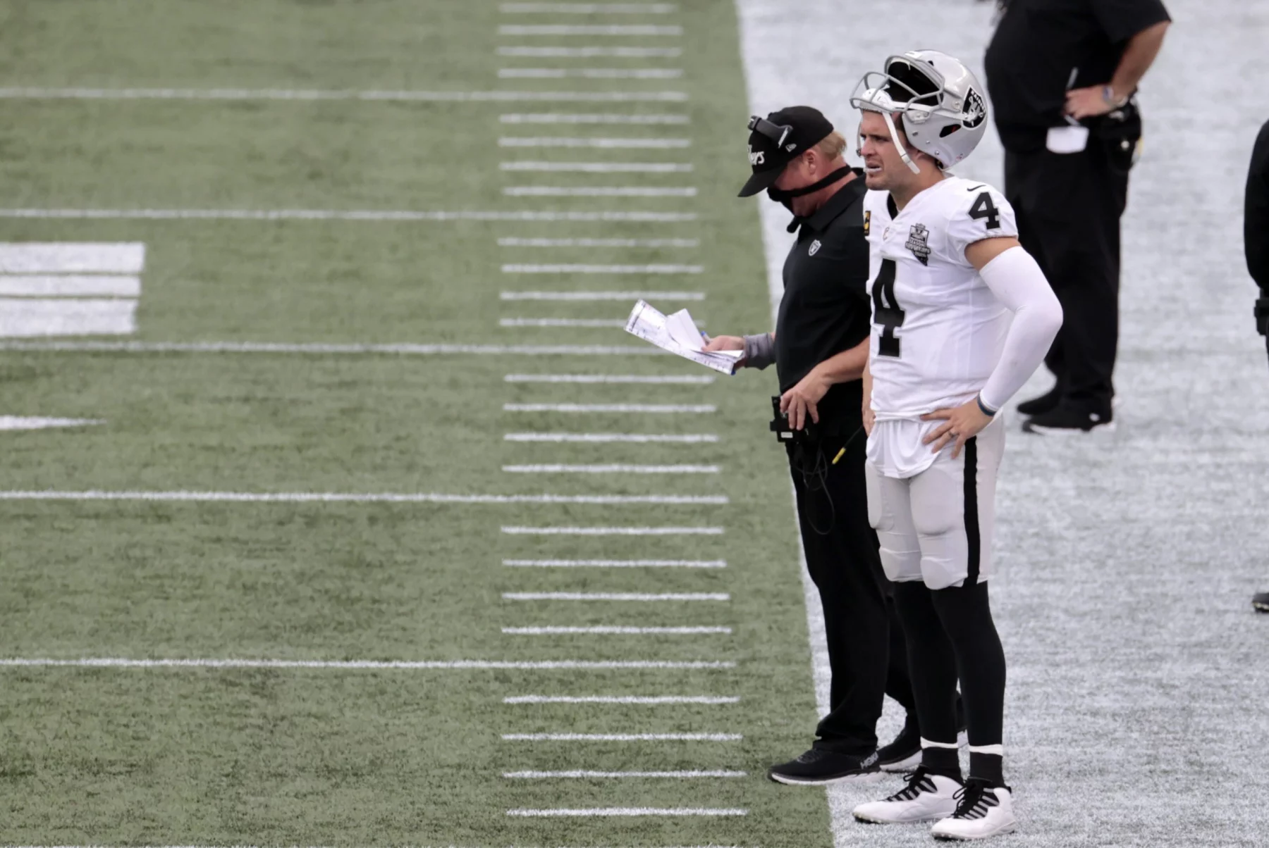 FOXBOROUGH, MA - SEPTEMBER 27: Las Vegas Raiders head coach Jon Gruden and Las Vegas Raiders quarterback Derek Carr (4)