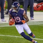 CHICAGO, IL - OCTOBER 08: Chicago Bears Wide Receiver Ted Ginn (19) runs with the football in game action during a NFL,