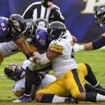BALTIMORE, MD - NOVEMBER 01: Baltimore Ravens quarterback Lamar Jackson (8) is sacked by Pittsburgh Steelers defensive e