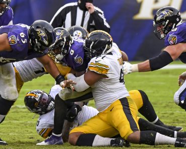 BALTIMORE, MD - NOVEMBER 01: Baltimore Ravens quarterback Lamar Jackson (8) is sacked by Pittsburgh Steelers defensive e