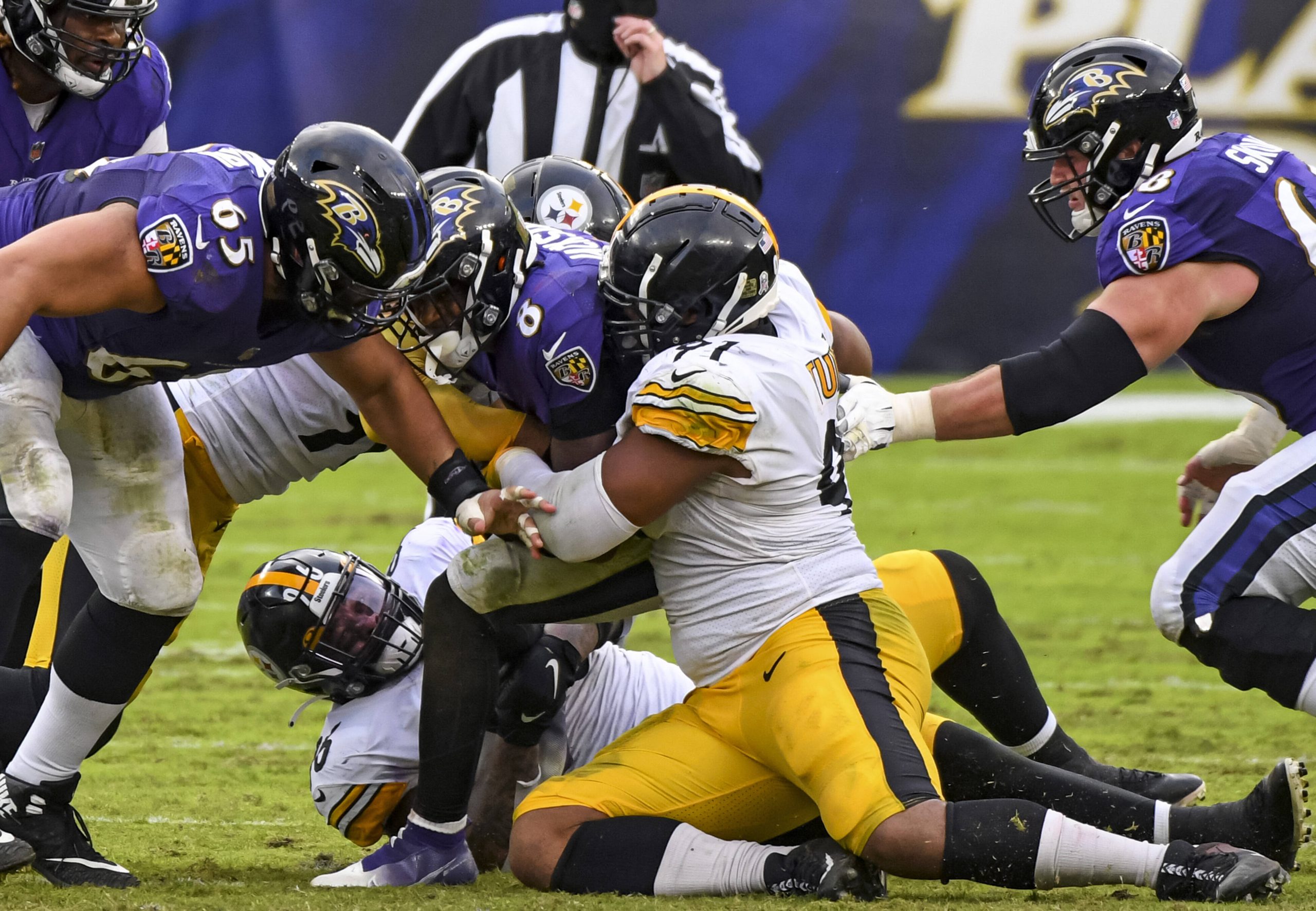BALTIMORE, MD - NOVEMBER 01: Baltimore Ravens quarterback Lamar Jackson (8) is sacked by Pittsburgh Steelers defensive e
